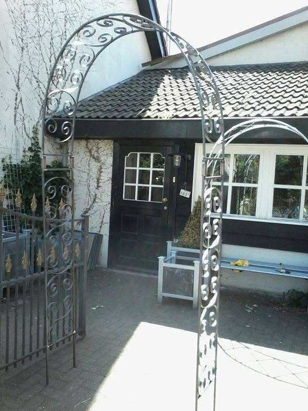 Smeedwerk — Handgesmede rozenboog op maat, Nederland