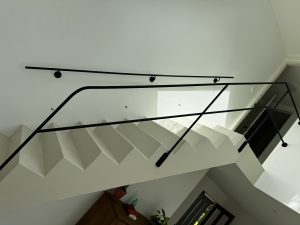 Stalen trapleuning en balustrade in moderne vide in Heiloo